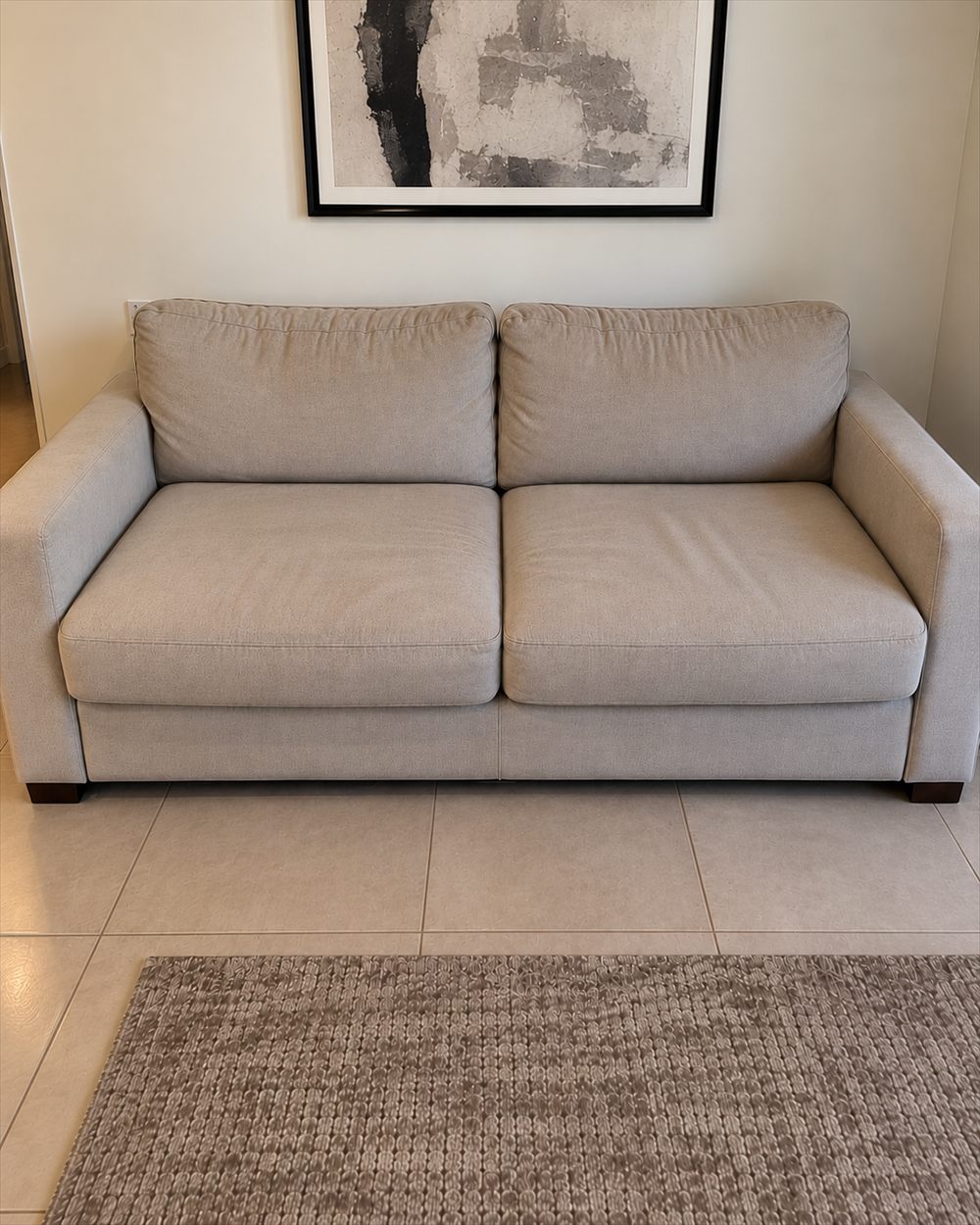 The same sofa clean and refreshed after hot water extraction